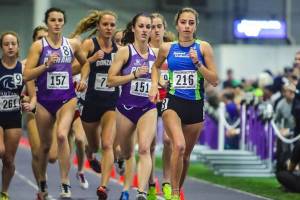 Issaquah Eagles sophomore Julia David-Smith (pictured furthest on the right) clocked a time of 5:04. 16 in the one-mile run at the University of Washington indoor track meet on Jan. 12 in Seattle. David-Smith earned first place in the Section 4 heat of the race. David-Smith finished ahead of collegiate athletes from the University of Portland, Gonzaga University, Seattle Pacific University, Western Oregon University, Simon Fraser University and Trinity Western in the race. Photo courtesy of Don Borin/Stop Action Photography