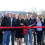 The official ribbon cutting on the new extension project was held on Monday, Jan. 28. City staff, contract workers, financial partners, and citizens all gathered for behind the ribbon for the official ceremony. Evan Pappas/Staff Photo