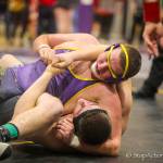 Issaquah Eagles grappler Mitchell Barnes pinned North Creek wrestler Daniel Shapovalov in the second round of the 4A KingCo 285-pound championship match. Barnes had an overall record of 4-0 at the tournament. Photo courtesy of Don Borin/Stop Action Photography