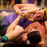 Issaquah Eagles grappler Mitchell Barnes pinned North Creek wrestler Daniel Shapovalov in the second round of the 4A KingCo 285-pound championship match. Barnes had an overall record of 4-0 at the tournament. Photo courtesy of Don Borin/Stop Action Photography