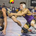 Issaquah Eagles 160-pound wrestler Cal Saper, right, captured three victories during the Mat Classic Class 4A state wrestling tournament on Feb. 15-16 at the Tacoma Dome. Photo courtesy of Don Borin/Stop Action Photography