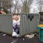 The trash situation at a Redmond apartment complex remained overflowing in the afternoon on Tuesday, Feb. 19, after a series of snowstorms hit the region in February. Corey Morris/staff photo