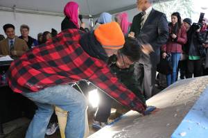 Redmond Mayor John Marchione was among many community members to place their hand prints in the wet cement below the new sign at the Muslim Association of Puget Sound in Redmond after the mosques old sign was vandalized in 2016. File photo