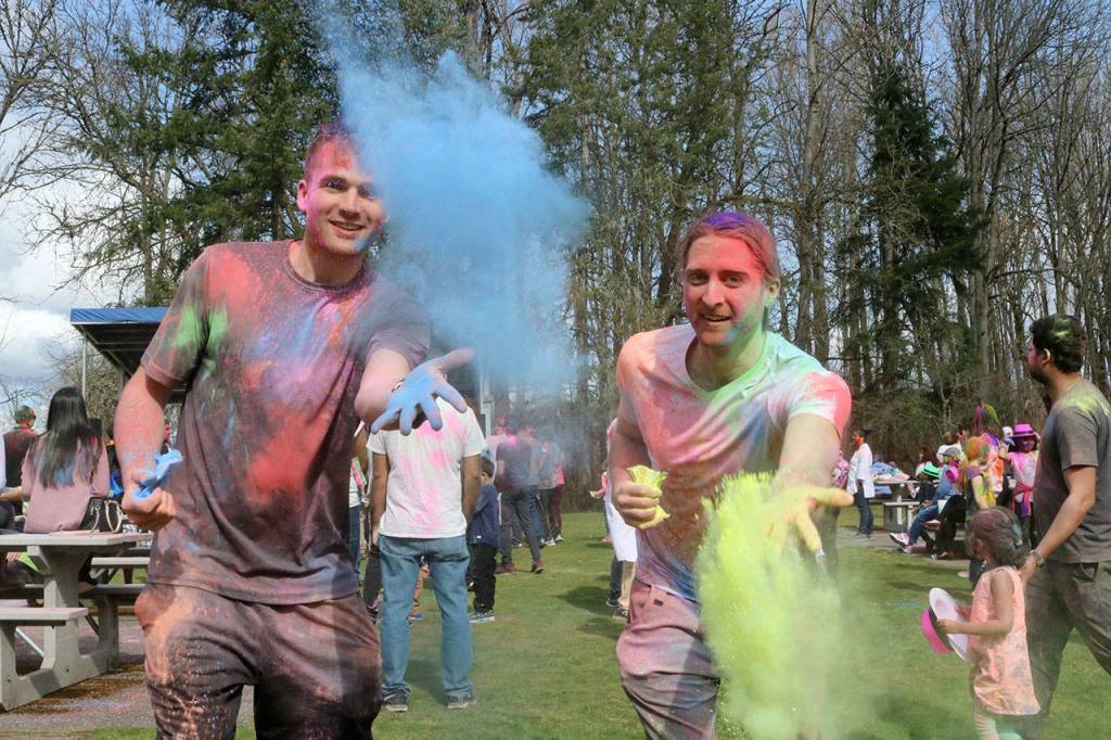 Bo Stallman and Steven Bogolub throw their color at the camera. Evan Pappas/Staff Photo