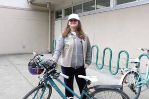 Stephanie Quiroz / staff photo                                Girl Scout Dylan Faaland is hosting an in-school workshop about bike safety for the student bicyclists at her school. Dylan is working toward her Silver Award from Girl Scouts of Western Washington.