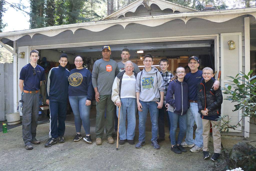 The Issaquah NJROTC cleaned Dale Browns yard and celebrated his 95th birthday on March 30. Stephanie Quiroz/staff photo