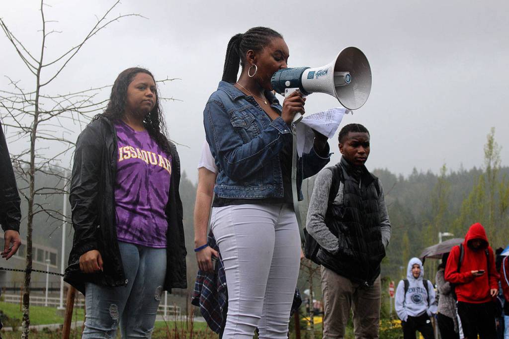 Student walkout organizers delivered speeches of intolerance to racism, hope for a better future, and a call for change. From left: Lauren Campbell and Engu Fontama. Madison Miller / staff photo