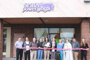 The Issaquah Chamber of Commerce held a ribbon cutting ceremony for Spira Power Yoga on April 9. Stephanie Quiroz/staff photo.