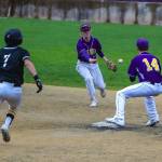Issaquah Eagles shortstop Tyler Reese, left, and second baseman Joseph DePalo turn a game-saving double play in the top of the sixth inning with the bases loaded. Issaquah defeated Ingelmoor 2-0 on April 12 in Issaquah. Photo courtesy of Don Borin/Stop Action Photography