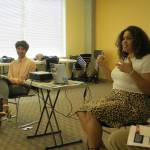 Samantha Pak/staff photo                                From left, Rachel Ramirez-Silva and Kalika Curry lead a discussion on talking about race at the Eastside Race and Leadership Coalitions race and equity summit.