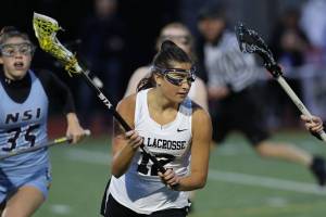 Issaquah senior midfielder Julia Hepperle, left, has scored a team-high 28 goals in 10 games thus far during the 2019 season. Photo courtesy of Rick Edelman/Rick Edelman Photography