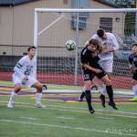Issaquah senior forward Gavin Herman battles with a Skyline player in front of the goal. Issaquah defeated Skyline, 3-1, to keep its season alive on May 7. Photo courtesy of Don Borin/Stop Action Photography