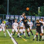 Issaquah senior Gage Howard (No. 6) battles with Mount Sis Reed Paradissis, left, for a 50/50 ball. Mount Si defeated Issaquah, 3-2, in a winner-to-semifinals, loser-out playoff game on May 18. Photo courtesy of Don Borin/Stop Action Photography