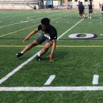 Issaquah football player Isaac Slippern displays his speed in the eye agility test on June 3 at Issaquah High School. Shaun Scott/staff photo