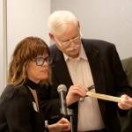 Brenda Devore, left, presented Mike Raab with the Issaquah Chamber Spawnor Roll award for all of the time and effort he puts into Salmon Days.