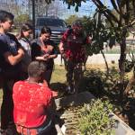 Photo courtesy of Nick Wold/Mercer Island High School                                Students from Mercer Island High Schools Margins program met with various nonprofit organizations in Los Angeles, including Watts Towers, where they speak with a representative about the organizations sustainable garden.