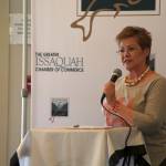 Ashley Hiruko/Staff photo                                Kathy McCorry, with the Issaquah Chamber of Commerce, outlines this years event during a gathering on June 11 at the Issaquah Salmon Hatchery.
