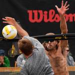 Jeremy Casebeer blocks a shot attempt by Taylor Crabb during the 2019 AVP Seattle Open mens championship match on June 23 at Lake Sammamish State Park. Photo courtesy of Robert Beck