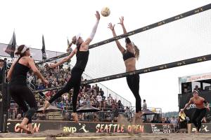 Emily Day, left, and Kelley Larsen, right, battle it out at the net during the womens championship match at 2019 AVP Seattle Open on June 23 at Lake Sammamish State Park. Photo courtesy of Robert Beck