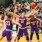 Issaquah Eagles boys basketball player Charlie Dietiker (No. 32) corrals a rebound against the Skyline Spartans during the 2018-19 season. Photo courtesy of Rick Edelman/Rick Edelman Photography