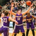 Issaquah Eagles boys basketball player Charlie Dietiker (No. 32) corrals a rebound against the Skyline Spartans during the 2018-19 season. Photo courtesy of Rick Edelman/Rick Edelman Photography