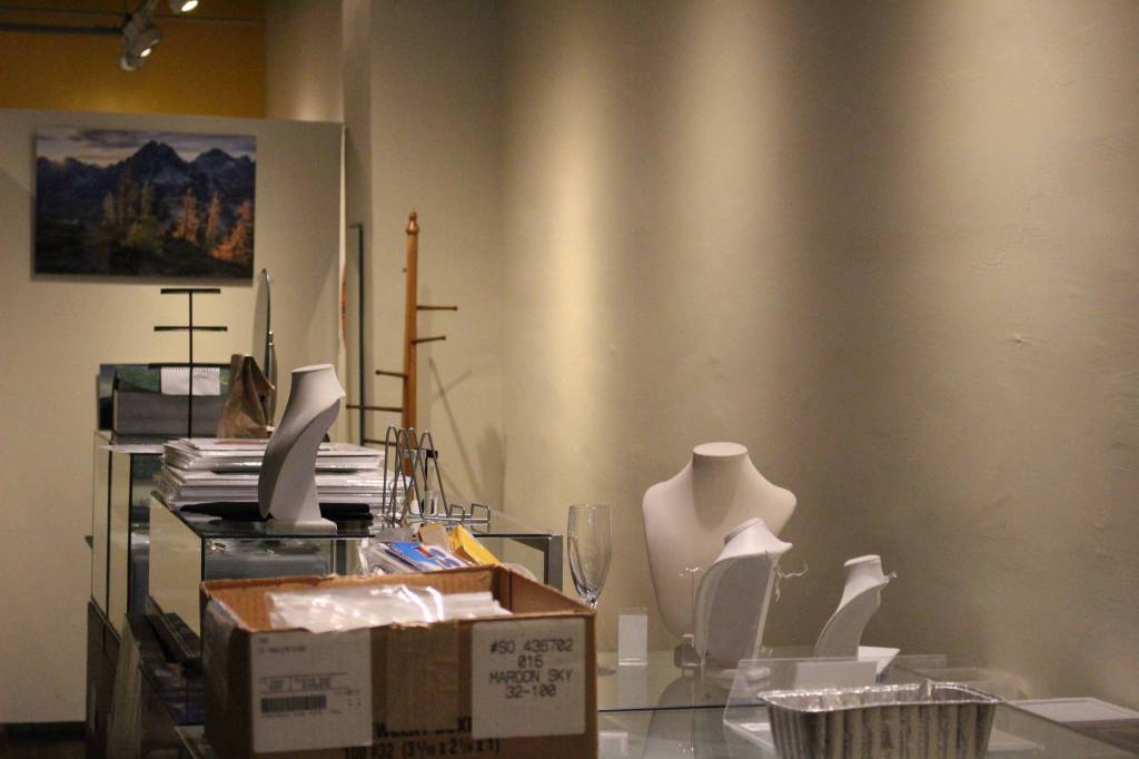 Walls and mannequin busts lay bare as items are packed away into boxes and artists collect their works on Tuesday, July 23. Madison Miller / staff photo
