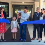Photo courtesy of Issaquah School District                                Discovery Elementary School unveiled its new remodel on Sept. 3 with a ribbon cutting ceremony. From left: Assistant Superintendent of Elementary Education Jodi Bongard, School Board Director Suzanne Weaver, School Board President Harlan Gallinger with his daughter, Lucy Gallinger, to the left peeking over the ribbon, Superintendent Ron Thiele, School Board Director Marnie Maraldo, and School Board Director Anne Moore.