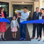 Photo courtesy of Issaquah School District                                Discovery Elementary School unveiled its new remodel on Sept. 3 with a ribbon cutting ceremony. From left: Assistant Superintendent of Elementary Education Jodi Bongard, School Board Director Suzanne Weaver, School Board President Harlan Gallinger with his daughter, Lucy Gallinger, to the left peeking over the ribbon, Superintendent Ron Thiele, School Board Director Marnie Maraldo, and School Board Director Anne Moore.