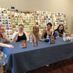 Photo by Samantha Pak/staff photo                                Authors, from left, Lauren Dane, Olivia Waite, Somaiya Daud, Jasmine Silvera and A.J. Hackwith and moderator Casey Blair discuss reclaiming history at Brick & Mortar Books in Redmond.