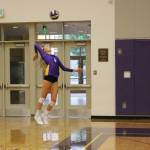 Sidney Cottrell serves the ball during an Issaquah volleyball practice. Benjamin Olson/ staff photo