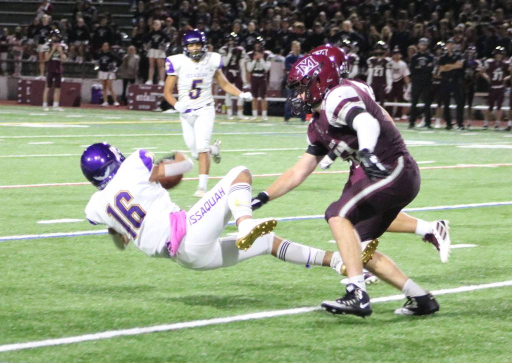 Eagles defensive back Steven Castro comes down with an interception during the third quarter of a 12-3 Issaquah victory over Mercer Island on Sept. 13. Benjamin Olson/ staff photo