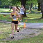 Issaquah sophomore cross country runner, Darwin Hanson, running during the KingCo Jamboree Class Race on Sept. 11. Hanson would finish second in the sophomore girls race with a time of 12:13.10. Benjamin Olson / staff photo