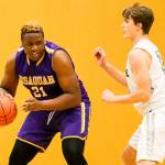 Issaquah Eagles forward Asa Taylor, left, prepares to make a move in the low post in a game against the Skyline Spartans. Photo courtesy of Rick Edelman/Rick Edelman Photography