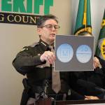 King County Sheriff Mitzi G. Johanknecht shows what M30 pills look like at a news conference Wednesday. Madison Miller / staff photo
