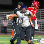 Issaquah running back Isaac Pak celebrates in the end zone after scoring the Eagles only touchdown in a 7-6 win over Newport on Oct. 4. Photo courtesy of Patrick Krohn/Patrick Krohn Photography