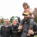 From left: Grandmother Barb Motley, mom Caitlin Derr, 10-month-old baby Roya, Corey Derr and 3-year-old Sylvie watch the Salmon Days grande parade on Oct. 5 in downtown Issaquah. Natalie DeFord/staff photo.