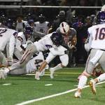 Issaquah defensive lineman Stephan Sweeney (11) tackles Mount Si wide receiver Colby Botten (5) during the Eagles 34-0 loss on Oct. 11. Photo courtesy of Calder Productions