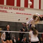 Issaquah middle hitter Sidney Cottrell jumps to hit the ball during the Eagles 3-2 victory over the Mount Si Wildcats on Oct. 16. Benjamin Olson/staff photo