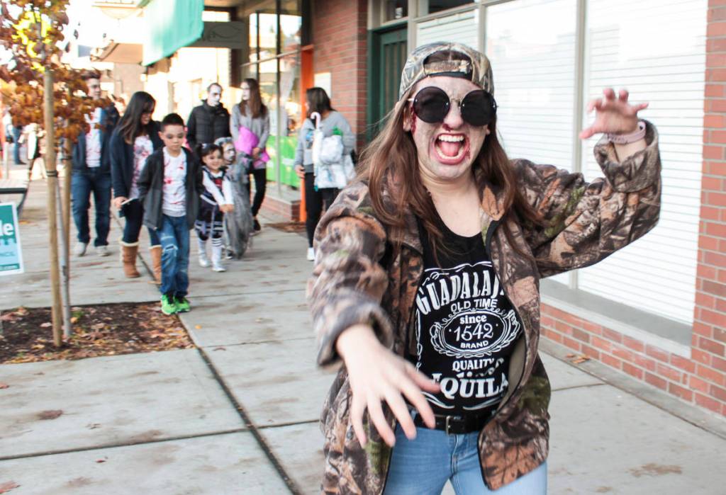 Natalie DeFord/Staff photo                                Hundreds participate in Oct. 26 10th annual Issaquah Zombie Walk and flash mob Thriller dance at City Hall.