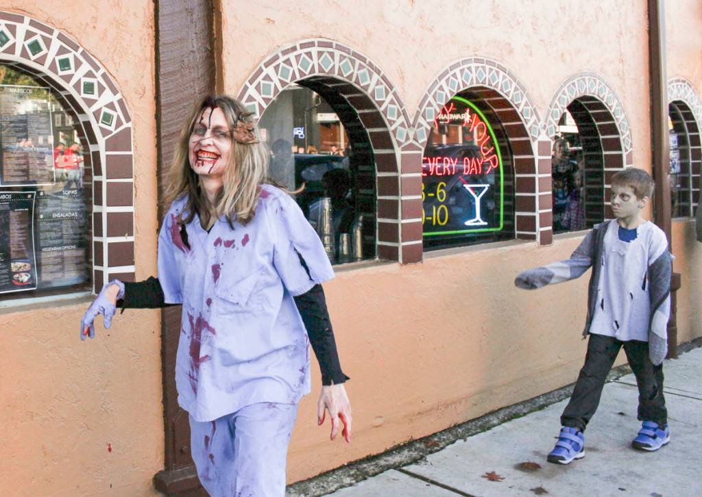 Natalie DeFord/Staff photo                                Hundreds participate in Oct. 26 10th annual Issaquah Zombie Walk and flash mob Thriller dance at City Hall.