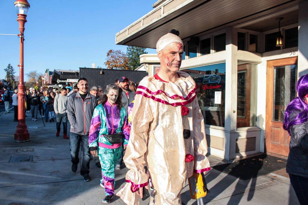 Natalie DeFord/Staff photo                                Hundreds participate in Oct. 26 10th annual Issaquah Zombie Walk and flash mob Thriller dance at City Hall.