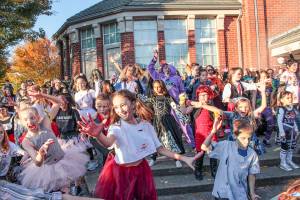 Natalie DeFord/Staff photo                                Hundreds participate in Oct. 26 10th annual Issaquah Zombie Walk and flash mob Thriller dance at City Hall.
