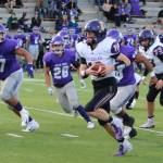Issaquah quarterback Jack Githens (10) runs the ball during a KingCo playoff game against North Creek on Nov. 2. Benjamin Olson/staff photo
