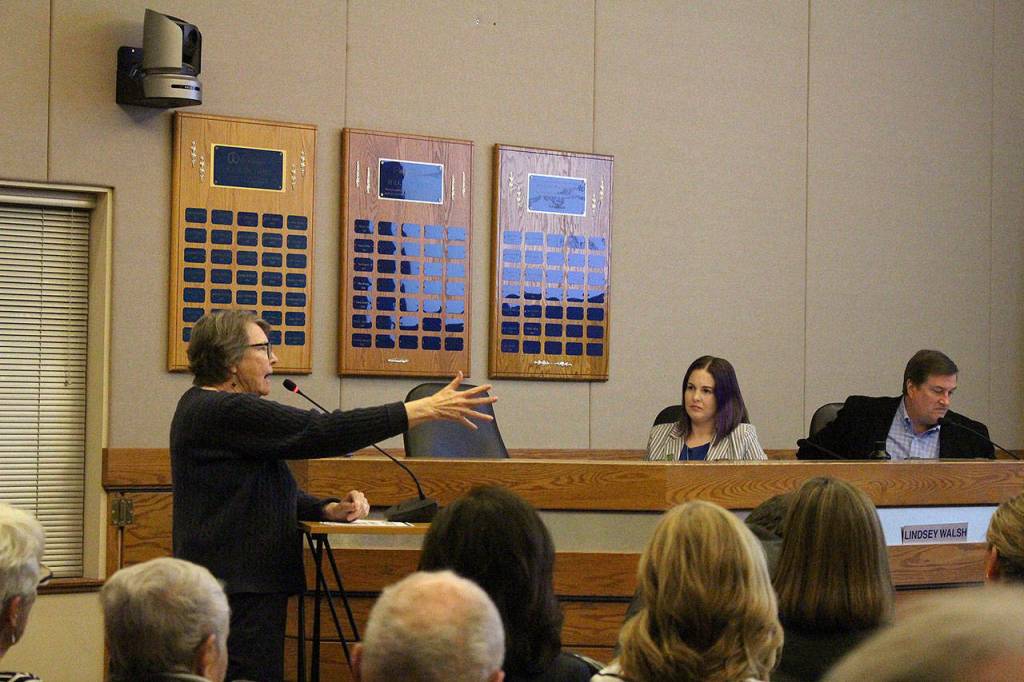 Daphne Gahne, a Providence Point resident addresses city council about the negatives of building a comprehensive high school so close to the Providence Point property at the Nov. 12 council study session. From left: Daphne Gahn, councilmember Lindsey Walsh and councilmember Chris Reh. Madison Miller / staff photo
