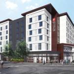 The centrally located Hilton Garden Inn Redmond Town Center (rendering shown here), due to open in early 2020, will appeal to business travellers and local residents alike, with its mix of conference, and food and beverage amenities.