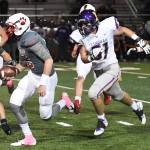 Issaquah defensive lineman Ryan Baker (right) received first-team 4A KingCo Crest all-league honors. Photo courtesy of Calder Productions