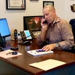 Mike Rocha, bail agent and manager of the Everett office of All City Bail Bonds, says agents often play various roles in a clients life, with the idea of helping them get on track. Photo by Mackenzie Schwartz/Sound Publishing