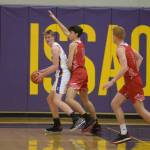 Issaquah junior Danny Howe (left) looks to make a play during the Eagles 53-39 loss to the Mount Si Wildcats on Jan. 7. Photo Courtesy of Calder Productions