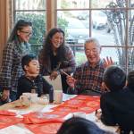Allen Chen demonstrates the art of Chinese calligraphy at a workshop during the Issaquah Highlands Lunar New Year festivities. Courtesy photo by Jenny Peng.