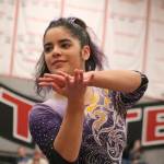 Issaquah senior Maya Mandyam performs her floor routine during the state gymnastics meet on Feb. 22 at Sammamish High School. Benjamin Olson/staff photo